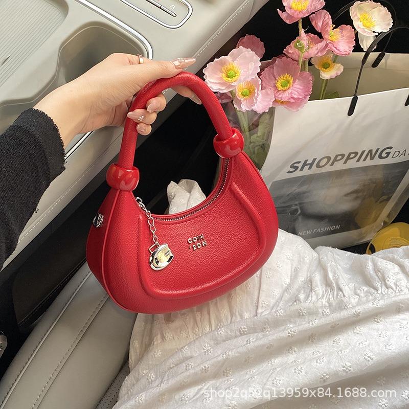 Niche design bag women's new trendy popular versatile messenger bag portable crescent bag
