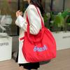 Korean version of the new letter printing bag women's large-capacity nylon shoulder bag casual versatile portable drawstring tote bag