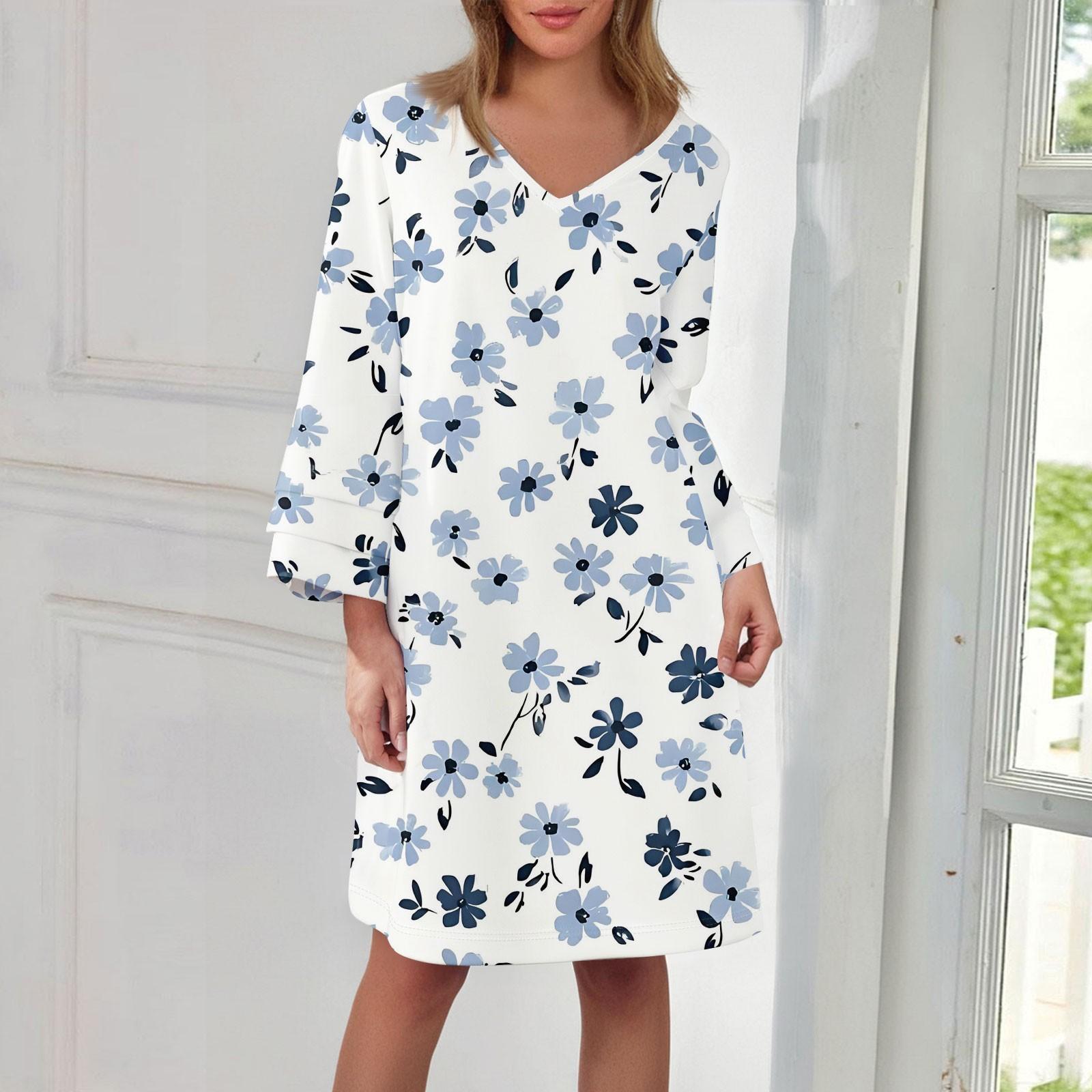 

Жіноча модна повсякденна міді-сукня з круглим вирізом та рукавом три чверті 140