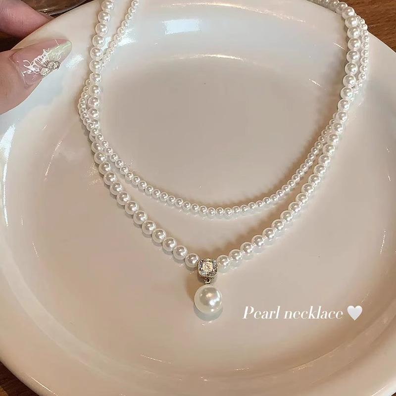 

Французское ретро двухслойное колье-чокер с жемчугом и бусинами проса