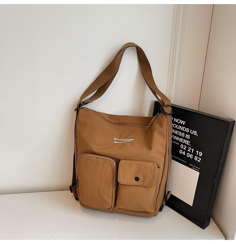 

2025 Japanese large-capacity new cloth bag bag women s new shoulder messenger bag underarm shoulder commuter tote bag коричневий
