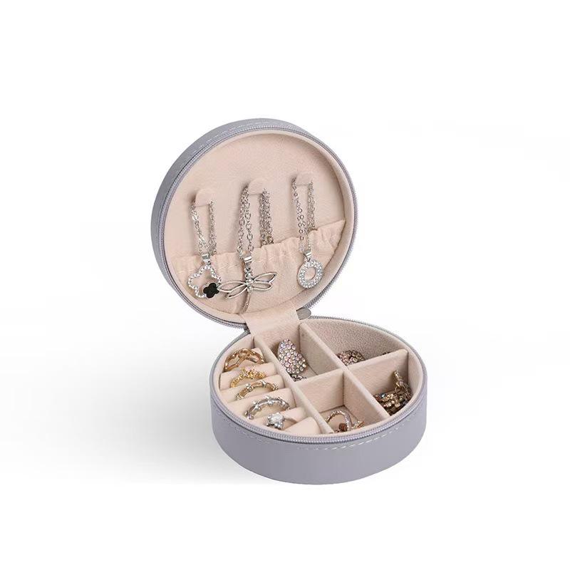 

Dustproof Round Earring Jewelry Storage Box with Zipper and Cross Pattern - Portable and In-Stock 9.5*9.5*4.5 cm сірий колір