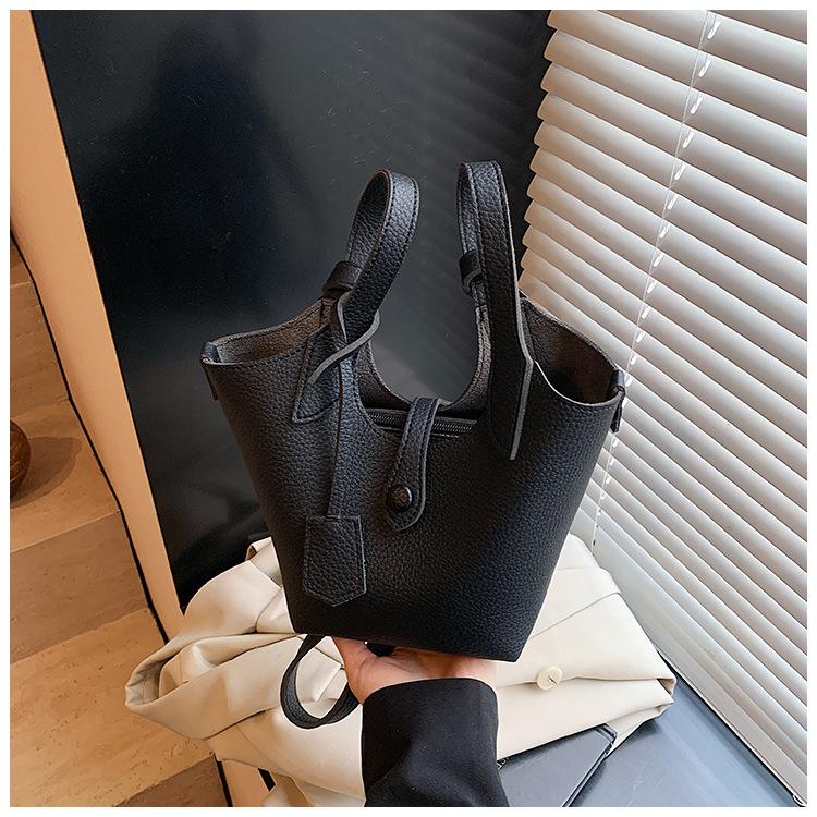 Wholesale 2025 new niche lychee pattern handbag bag women's Korean version simple bucket bag casual messenger bag