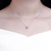 Sparkling Barrel Pendant Necklace with Textured Inlay and Central Ring Detail Modern Elegant Jewelry for Women