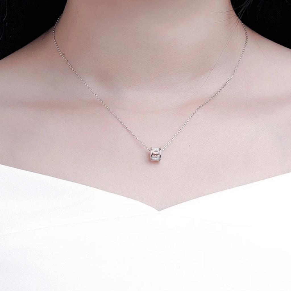 Sparkling Barrel Pendant Necklace with Textured Inlay and Central Ring Detail Modern Elegant Jewelry for Women