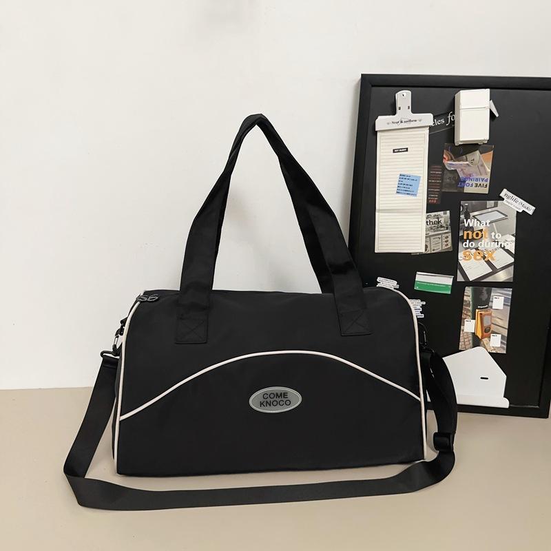 

Gift travel bags Large capacity Oxford cloth Short trip bags Luggage bags Portable fitness bags Men and women чорний