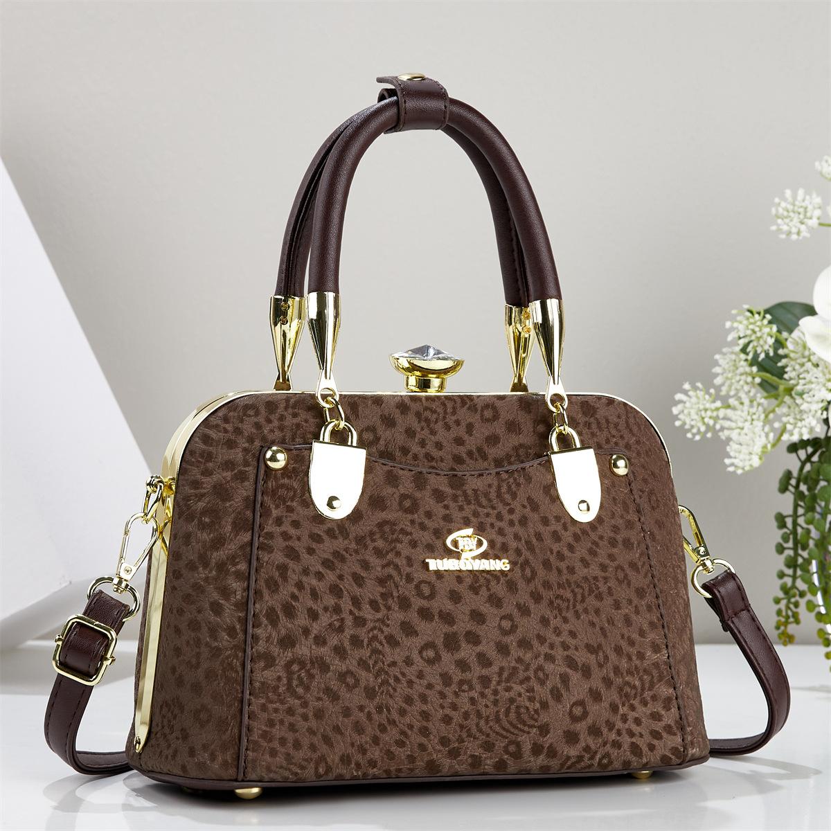 2026 New Retro Leopard Print Clip Handbag For Women