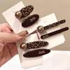 Korean Leopard Print Pearl Duckbill Hair Clip - Fashionable and Versatile Hair Accessory.