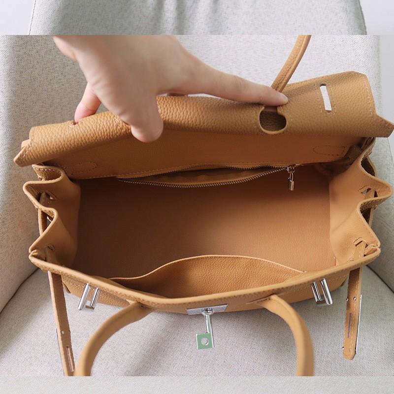 New Togo Top-layer Cowhide Horizontal Platinum Bag Large Capacity Fashion Leather Hand-to-shoulder Commuter Underarm Women's Bag