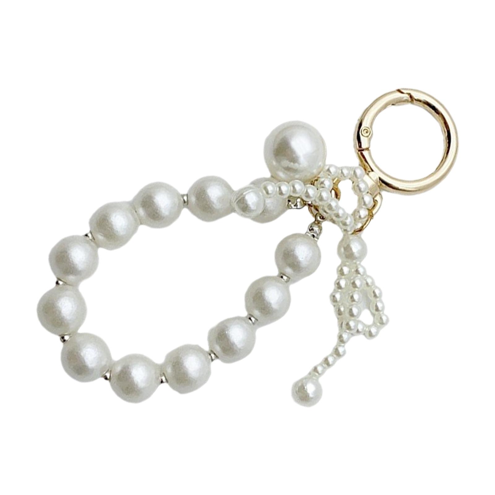 Стильный брелок-бантик с искусственным жемчугом — фото 3