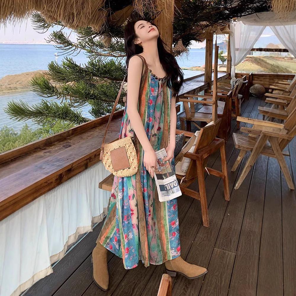 Seaside vacation floral spaghetti strap dress for women, new French vintage bohemian ethnic style, stunning midi skirt