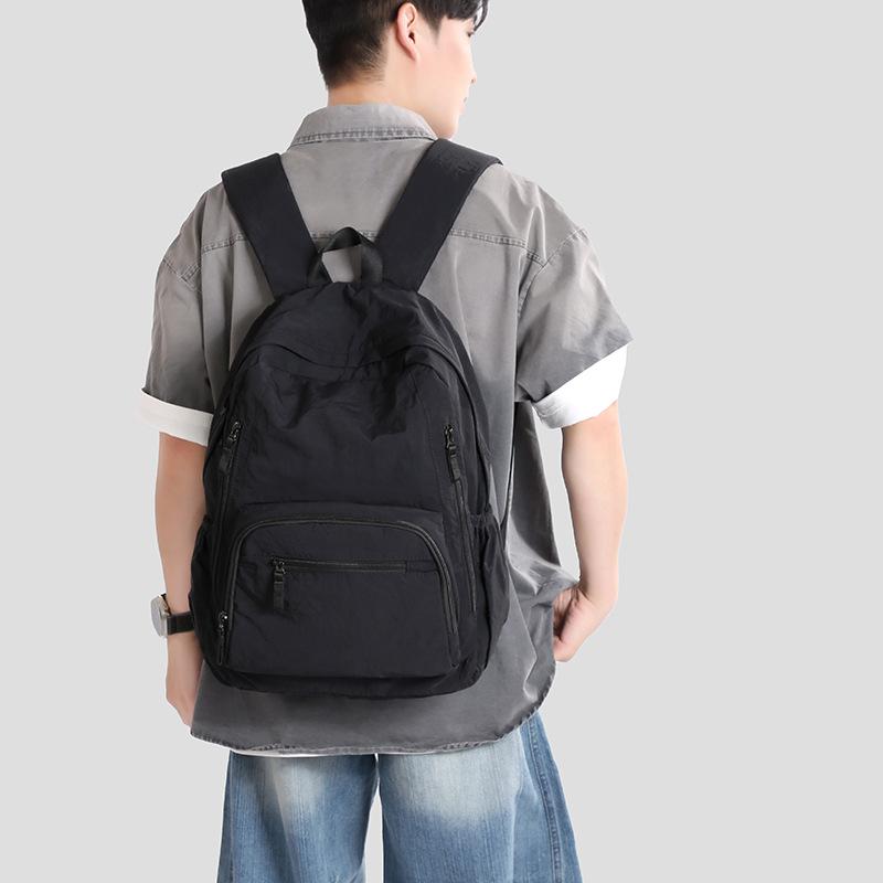 Ryggsäck i enfärgat dam lätt utomhusryggsäck stor kapacitet student skolväska