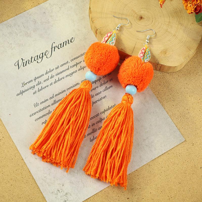 Bohemian retro pom-pom fringed earrings women's vacation long temperament niche personality earrings