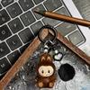 Three-dimensional Flocking Keychain Soft Glue Cute Baby Walking Bag Mobile Phone Pendant Cute Pendant