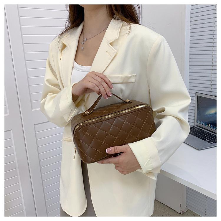 Neue hochwertige PU-Make-up-Tasche, modische und einfache gesteppte Kissen-Handtasche zur Handaufbewahrung, große Kapazität, Kulturtasche