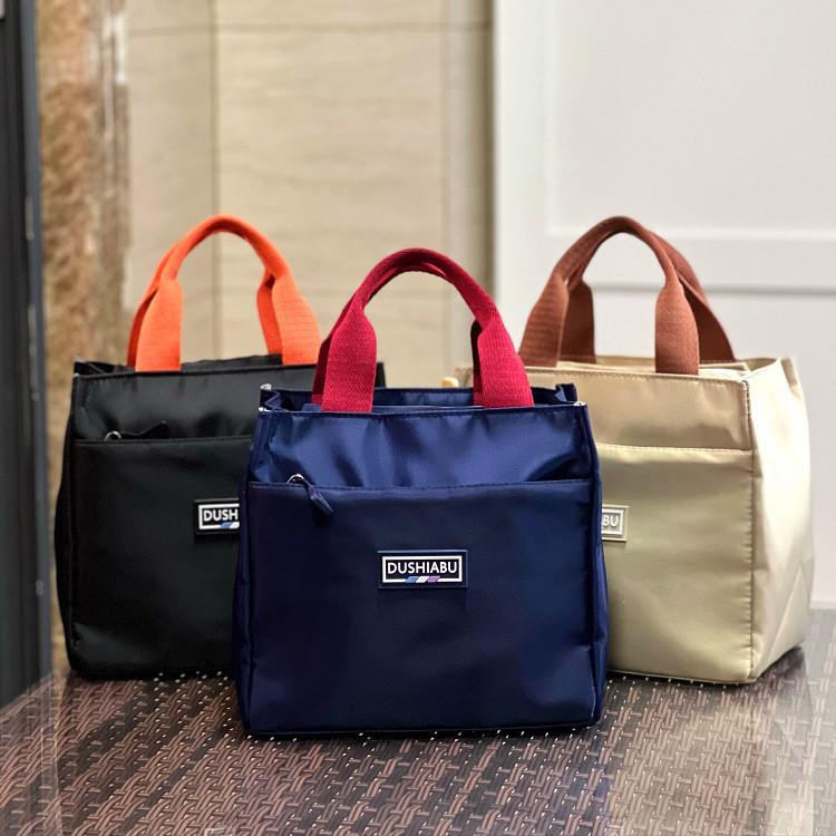 Modern Minimalist Oxford Lunch Bag For Students And Office Use With Wide Handle And Snack Storage