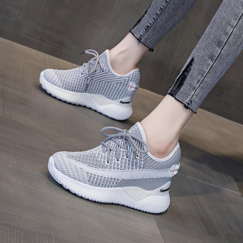 Herfst en winter ademende vlieg-geweven schoenen binnen hoogteverhoging casual antislip veters casual damesschoenen veelzijdige sportschoenen dames
