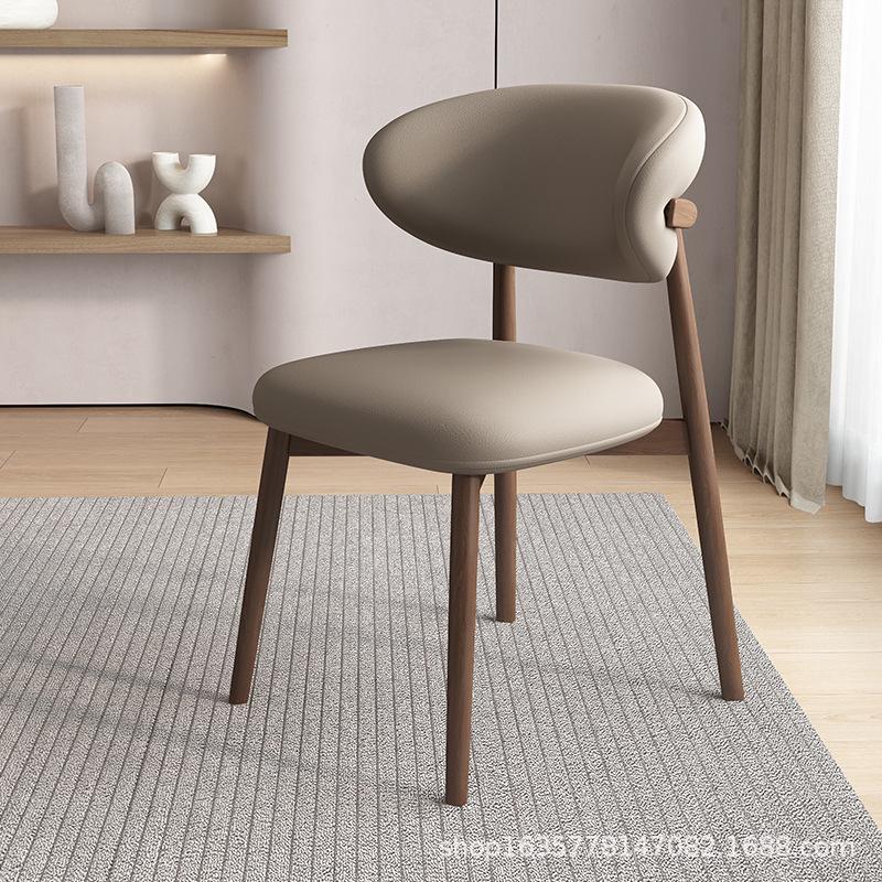 Nordic Modern Minimalist Solid Wood Dining Chair with Soft Pack Backrest - Comfortable Light Luxury Ram's Horn Design for Home, Restaurant, and Hotel.