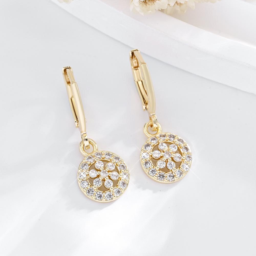 Boucles d'oreilles pendantes géométriques rondes en zircon plaqué or