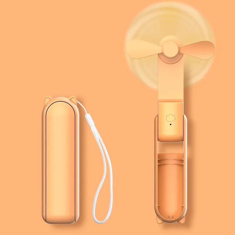 

Candy colored portable fan mini handheld fan unique design portable personal handheld fan USB charging with powerful turbo wind помаранчевий