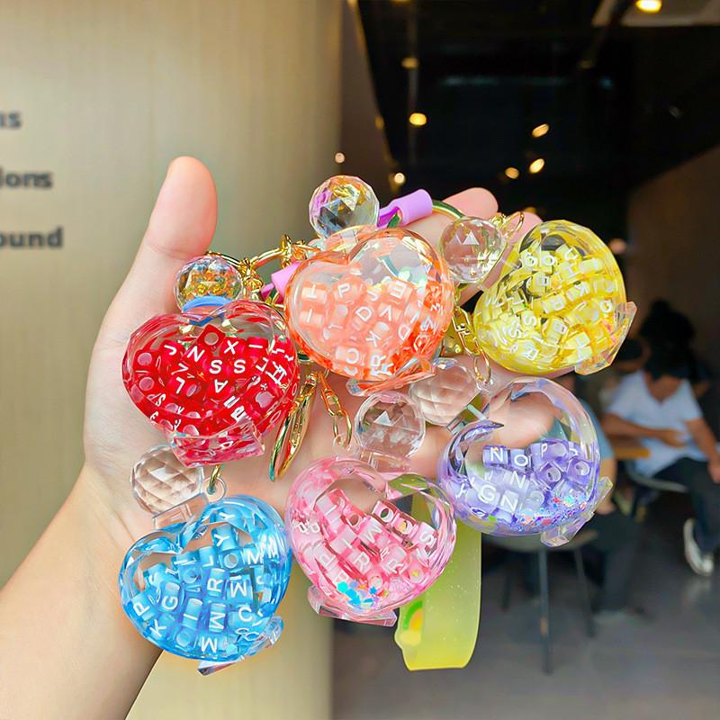 Exquisite Floating Sand Acrylic Perfume Bottle Keychain For Car Decor