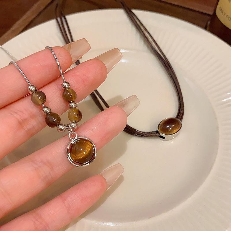 Autumn and winter Maillard tiger's eye stone beaded necklace femininity high-end sweater chain retro simple accessories