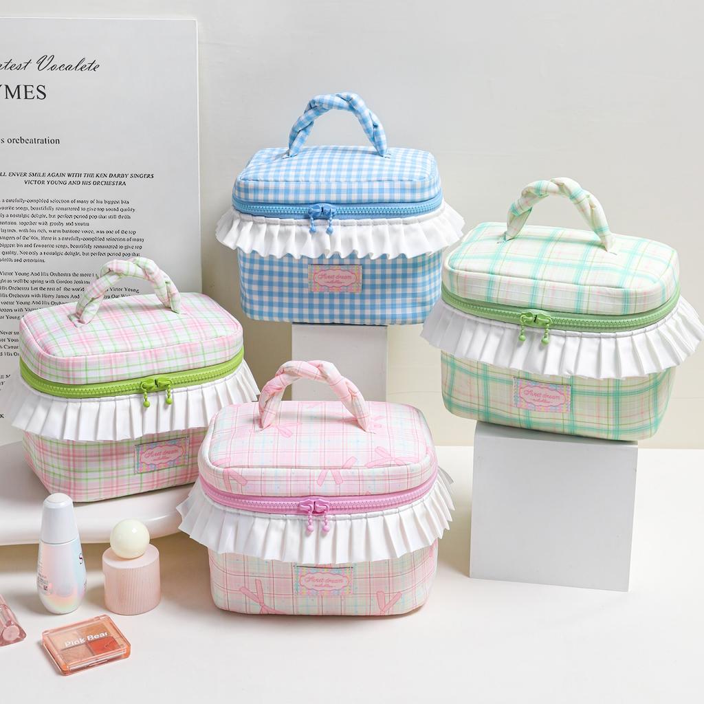 Korean-style niche design twisted handle makeup bag with large capacity pleated lace storage bag, color-blocked plaid wash bag.