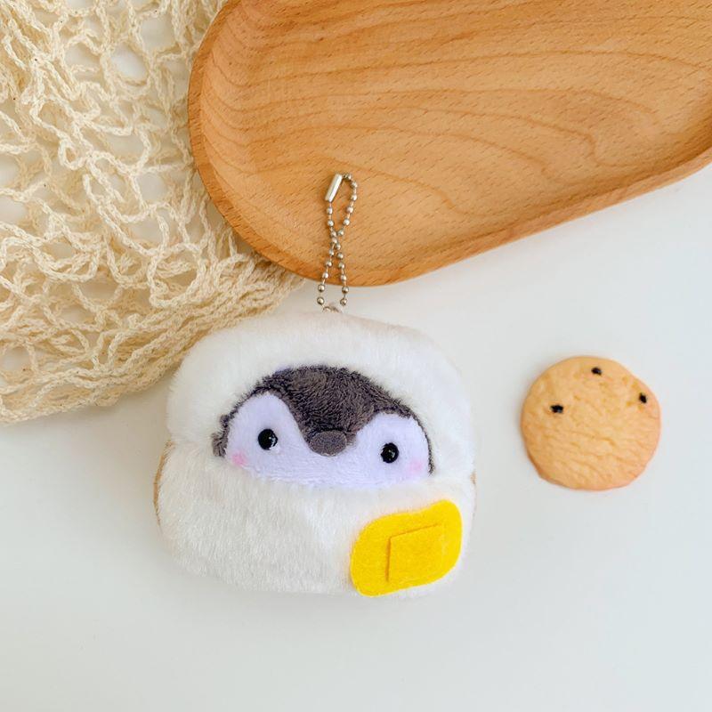 

Japanese Cute Penguin Bag Pendant Bread Plush Toy Sausage Doll Pendant Cute Egg Keychain Height about 7-11cm
