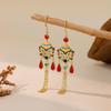 Sanxingdui-Inspired Tassel Earrings with Blessing God Official Design