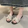 Fairy Xiaoxiangfeng Fashion Flat-bottomed One-word Slippers 2025 New French Pearl Girl Summer Wear Beach Cool Slippers
