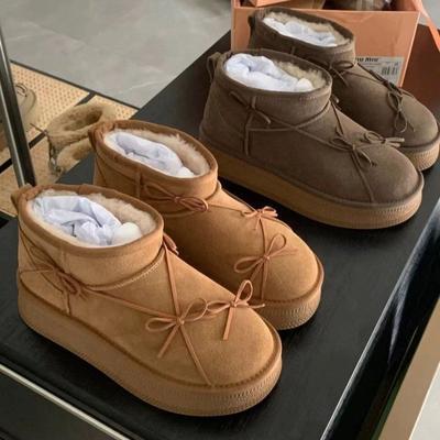 Bottes de neige à semelle épaisse à nœud pour femmes 2025 hiver nouveau cuir intégré antidérapant velours épaissi chaud bottines