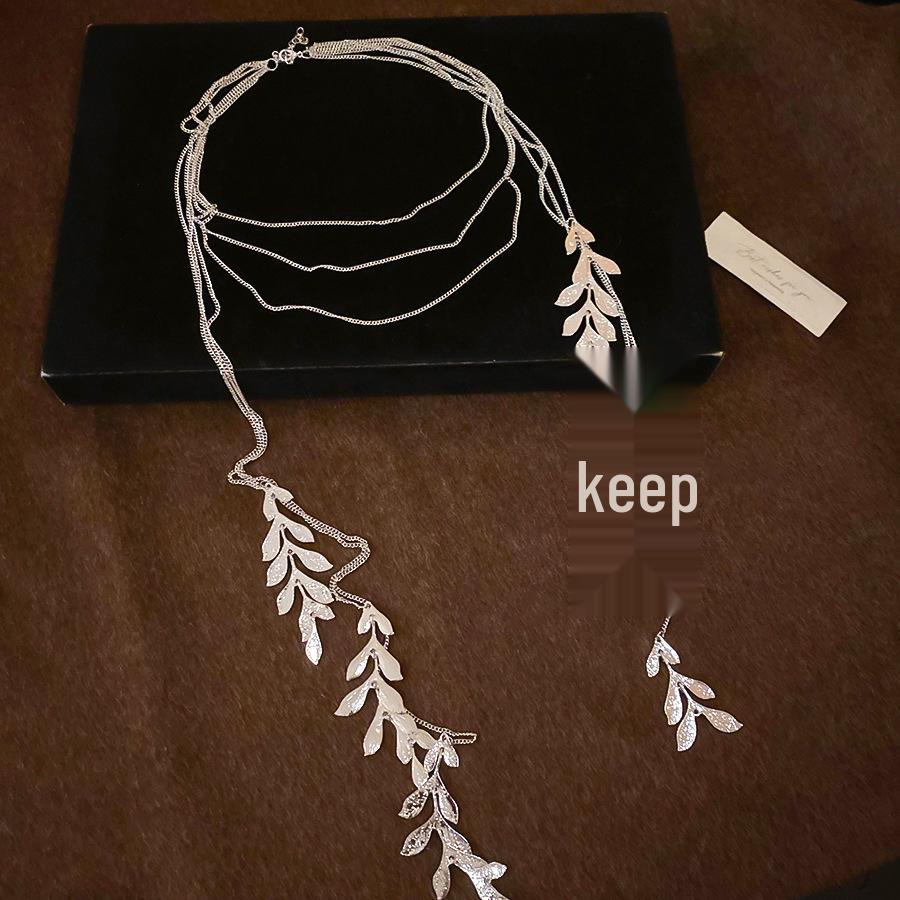 Преувеличенное металлическое ожерелье-цепочка со свисающим кулоном-кисточкой в виде листа для женщин