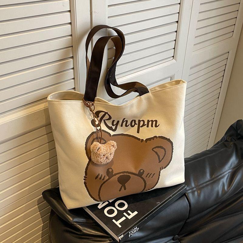 

Casual large-capacity bag women s summer new cartoon bear canvas bag college students commuting to class shoulder tote bag