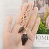 Rhinestone Strawberry Keychain: Cute Fruit Bag Charm & Light Luxury Metal Pendant for Women’s Car Keys