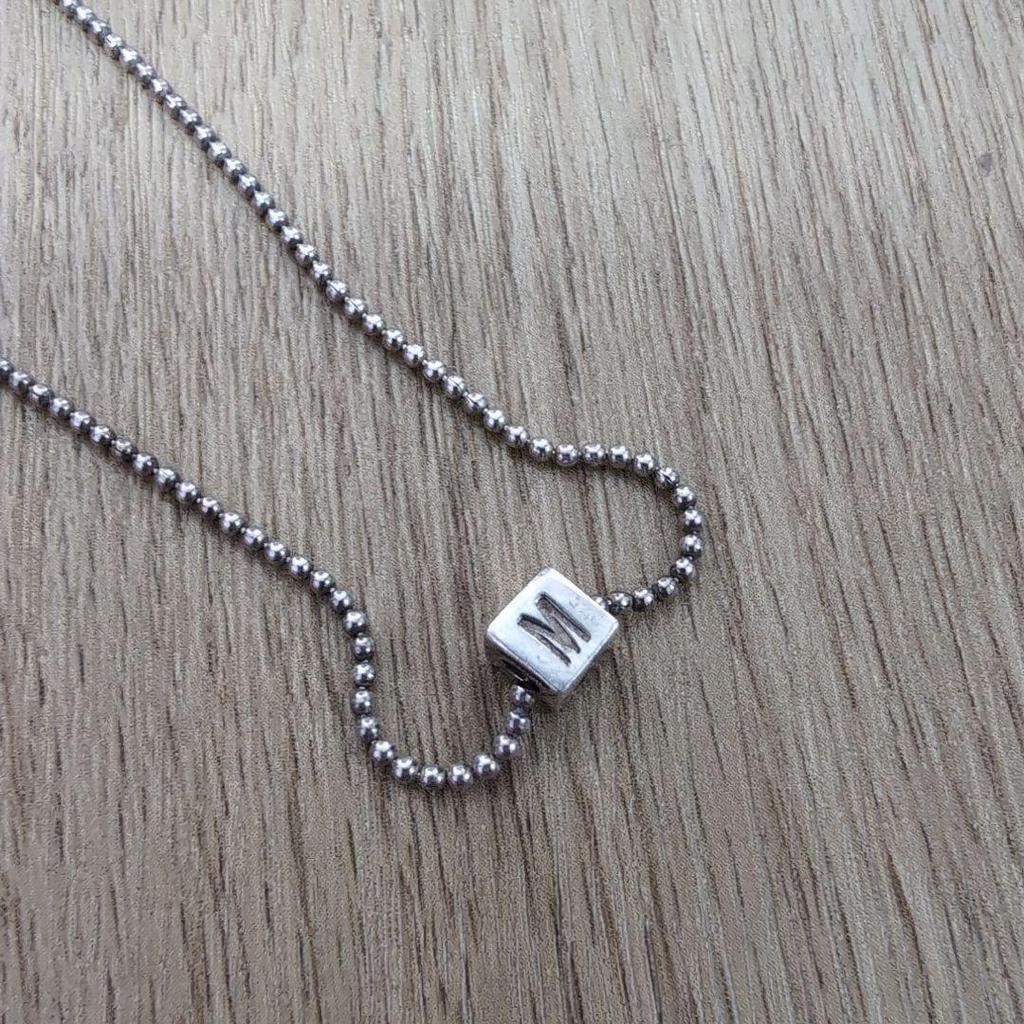 Used moschino silver necklace square dice