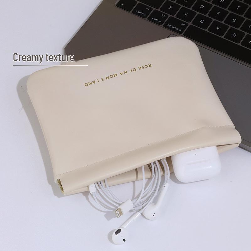 Waterproof PU Leather Mini Bag: Automatic Closing Coin, Earphone, and Makeup Storage