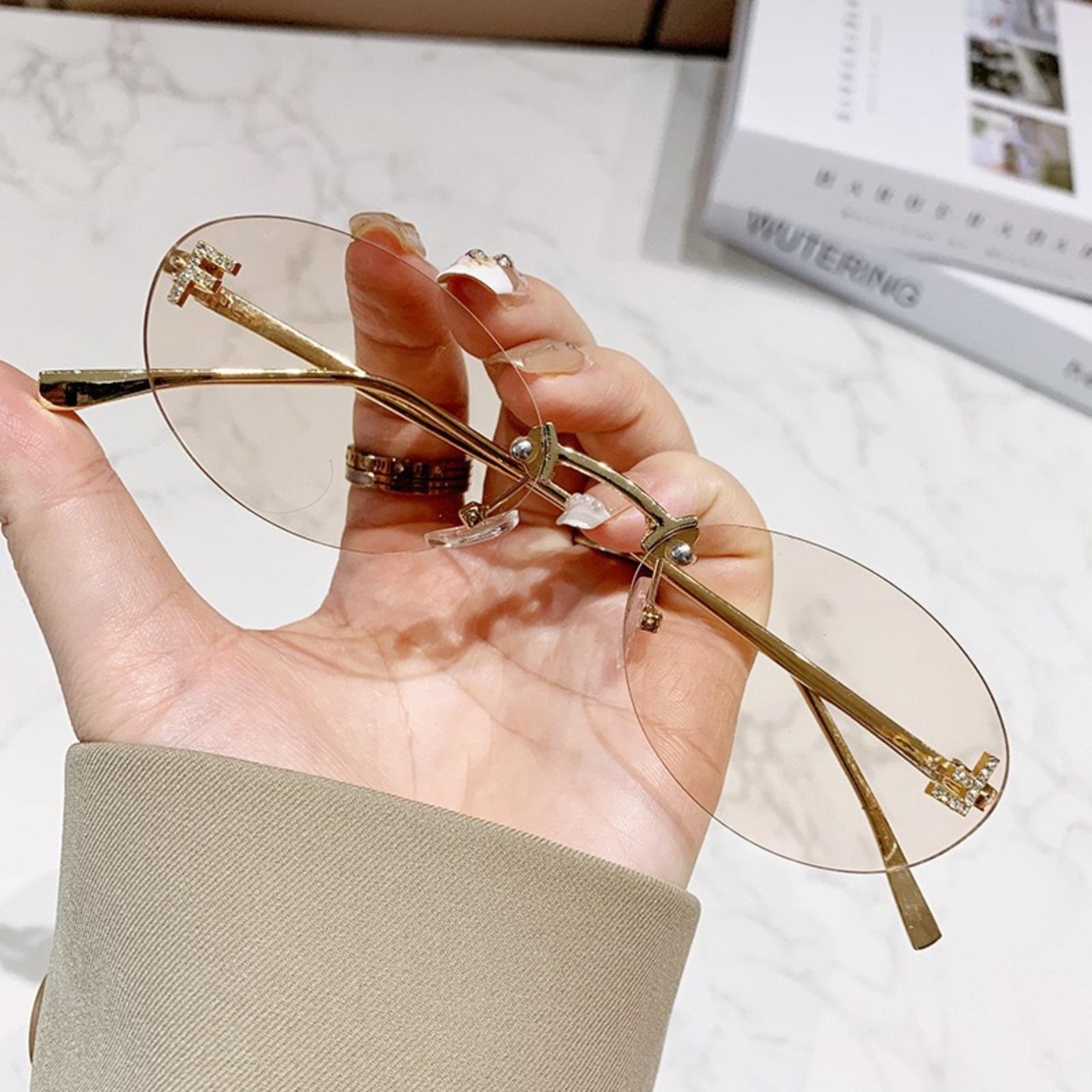 

Rimless Oval Frame Sunglasses with Letter Accent and Embedded Crystal Detailing for Women Fashion Street Style Eyewear UV Protection One Size