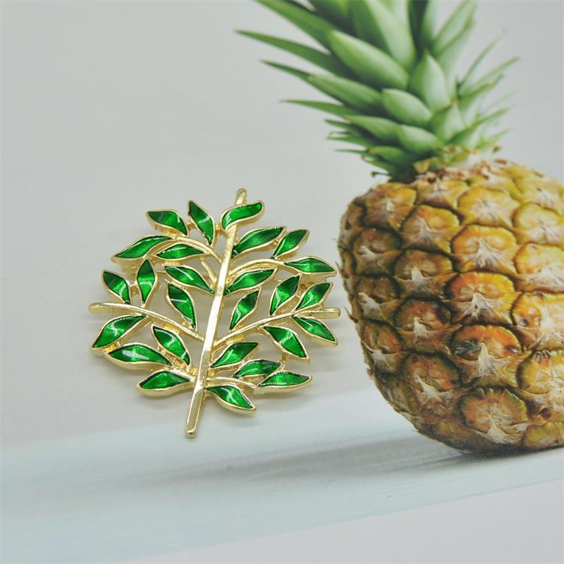 

Антикварная придворная эмалевая брошь-корсет в виде банта и листьев для кардигана