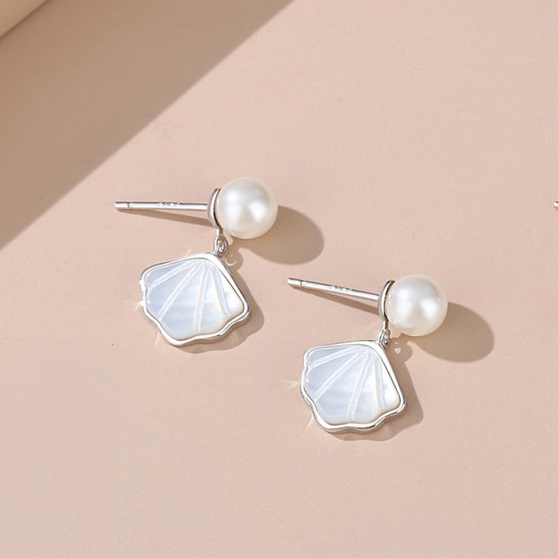 

Fashion and romantic White Fritillaria Earring Light Luxury Elegant earrings for women Party Wedding High Quality срібний