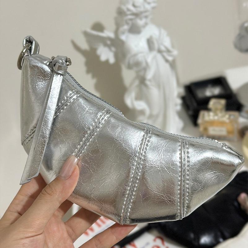 

Summer horn bag women s new fashion design sense niche silver shoulder messenger bag dumpling bag серебряный