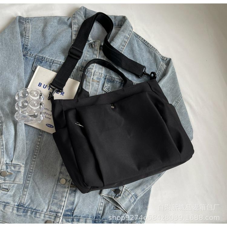 Large capacity canvas bag women's 2025 autumn and winter new casual shoulder bag simple class commuter messenger tote bag