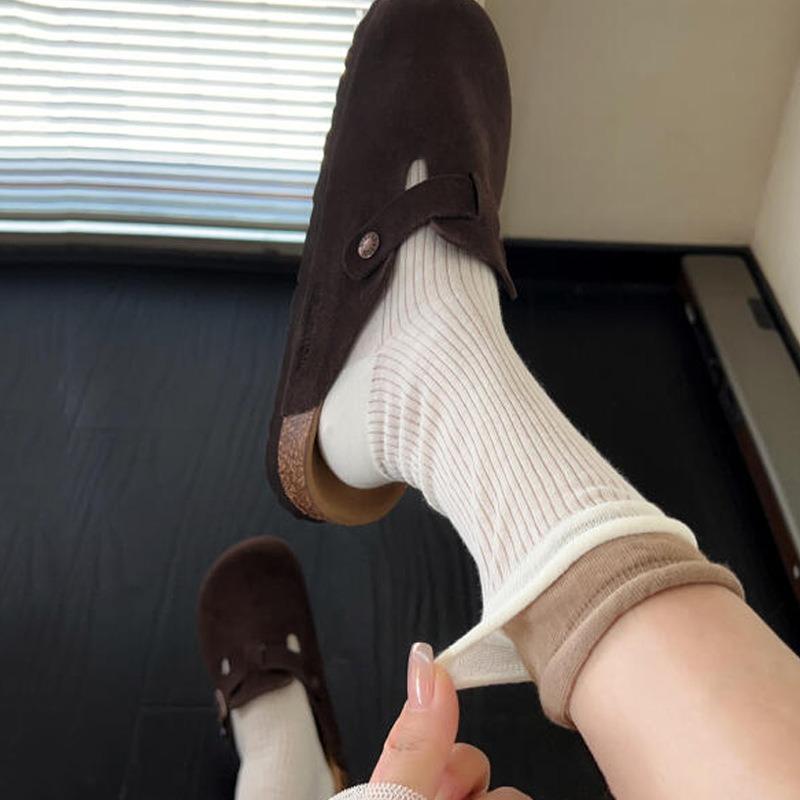 Grey Socks with Rolled-up Edges, Piles of Socks, Burken Shoes, Mid-calf Socks, and Contrasting Long Socks Are Trendy