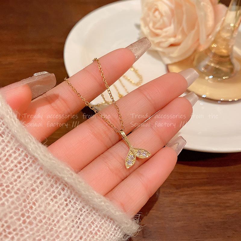 

Micro zircon human fishtail pendant necklace female titanium steel clavicle chain Korean version of Internet celebrities