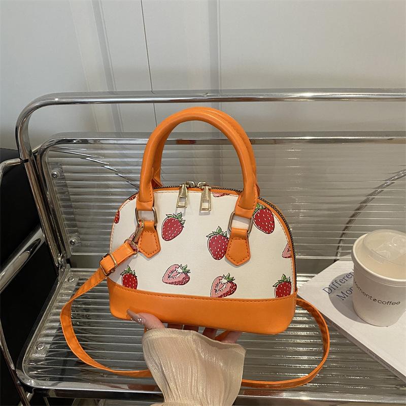 

2025 лето новая вишня портативная модная сумка сумка большая вместимость милая сумка-подушка на плечо для通勤 оранжевый