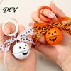 Pumpkin Bell Keychain with Bow Halloween Keychain, Hollow Head Key Ring Ribbon Bow, Backpacks Charm for Holiday Party Decoration Creepy
