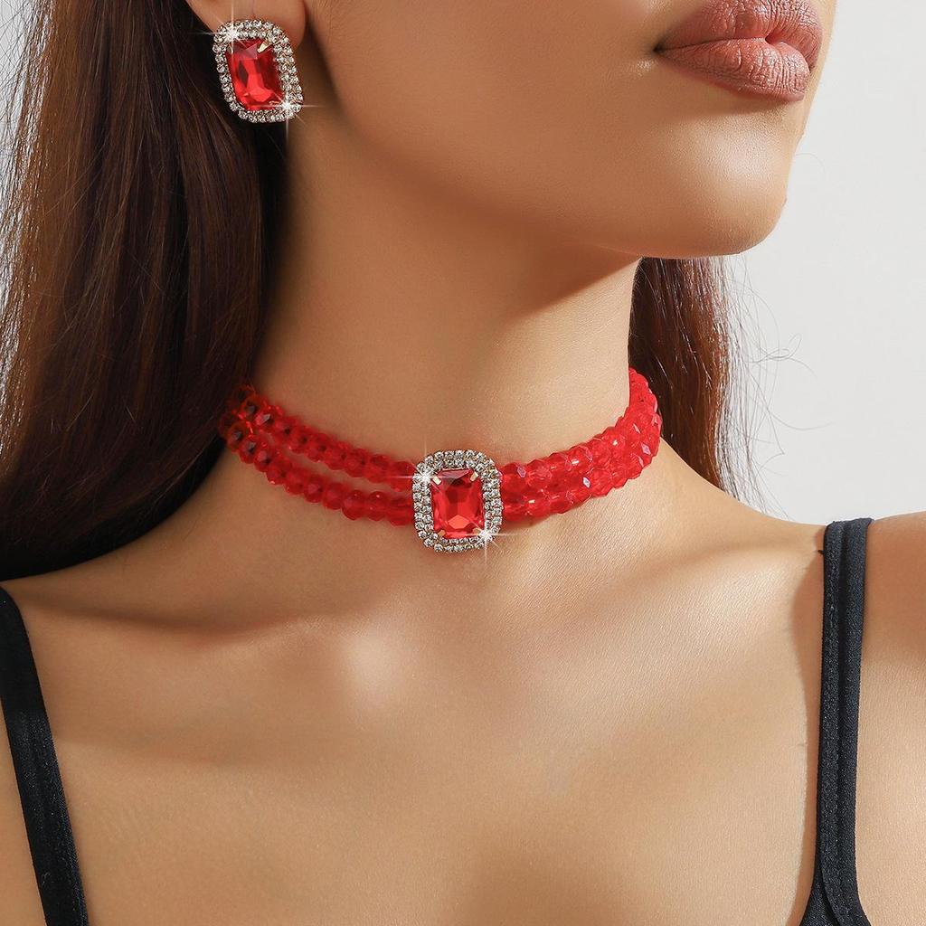 Luxuriöse doppellagige geometrische Kristallkette und rechteckiges Ohrstecker-Set