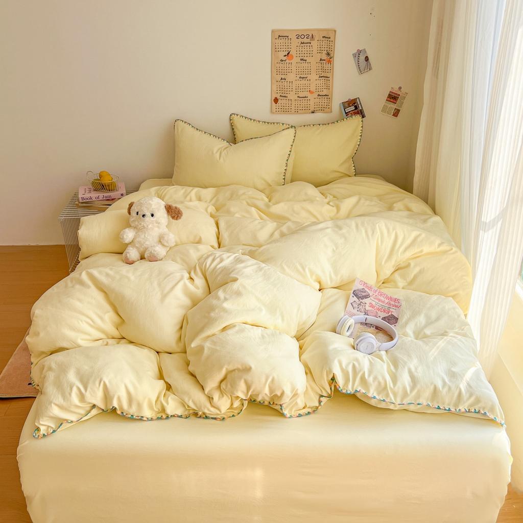 Literie Class A 2025 nouveau vent crème couleur unie drap de lit ensemble quatre pièces housse de couette étudiante ensemble quatre pièces ménage