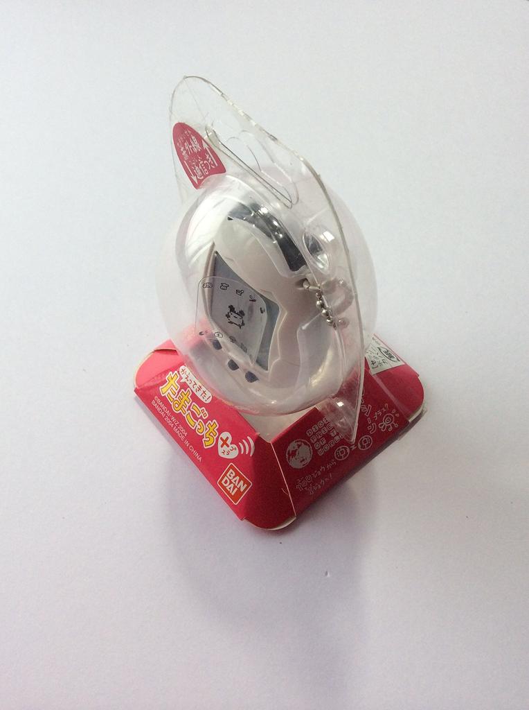 Tamagotchi Plus White Black Button Is Back