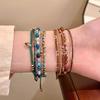 Buntes mehrschichtiges Perlenarmband - Elegantes und raffiniertes Handaccessoire für Damen mit verstellbarem Design