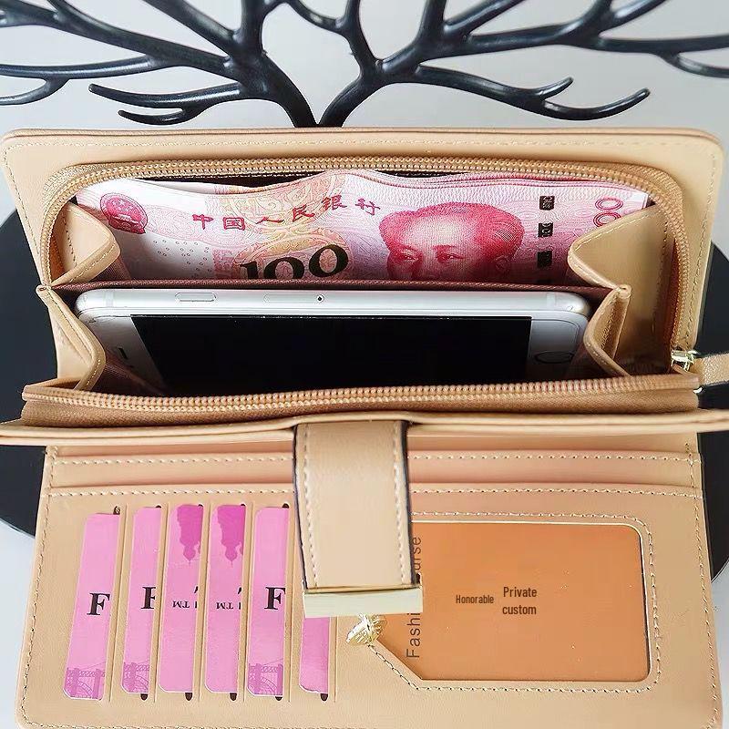 Youthful Embossed Long Wallet: Three-in-One Coin Purse, Anti-Magnetic, Multi-Card Slot Holder, with Elegant Cutout Design.